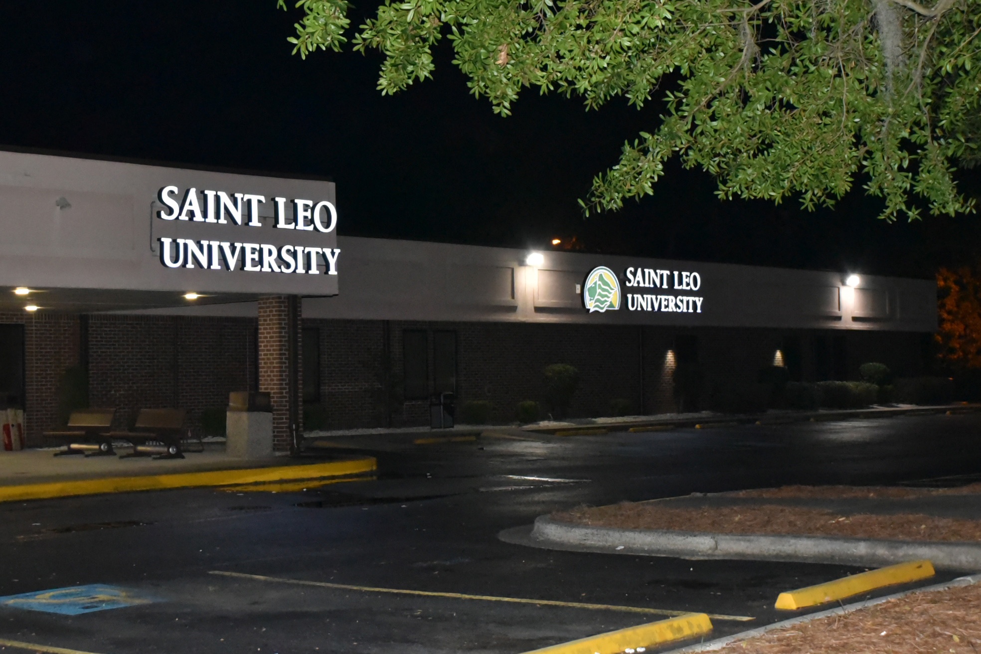 A shot of Saint Leo's Savannah Education Center building from the outside at night